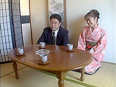 Woman Wetting Kimono During Meeting